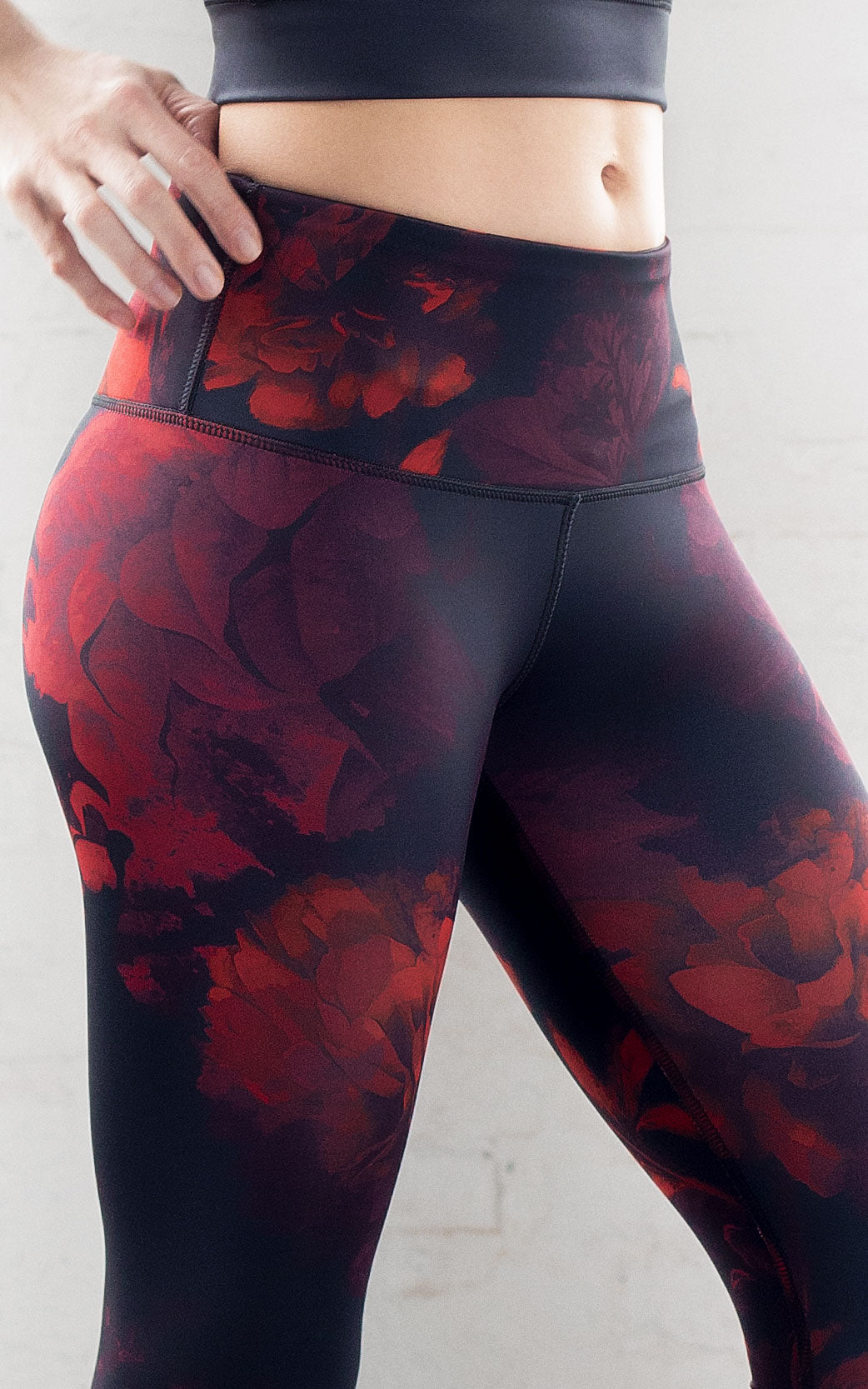 Women's Full length legging in an elegant dark red floral pattern. High Rise, High Band fit with 26" Inseam. Fabric is luxury blend and all black inside