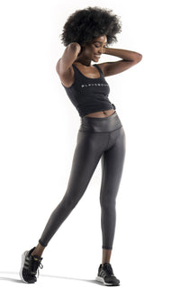 Women's black faux leather leggings in a nylon spandex blended fabric for excellent stretch, fit and comfort. Be seen in fall's hottest rend of the season. Smooth hand feel with high fashion look. Fabric has excellent recovery for working out or street wear